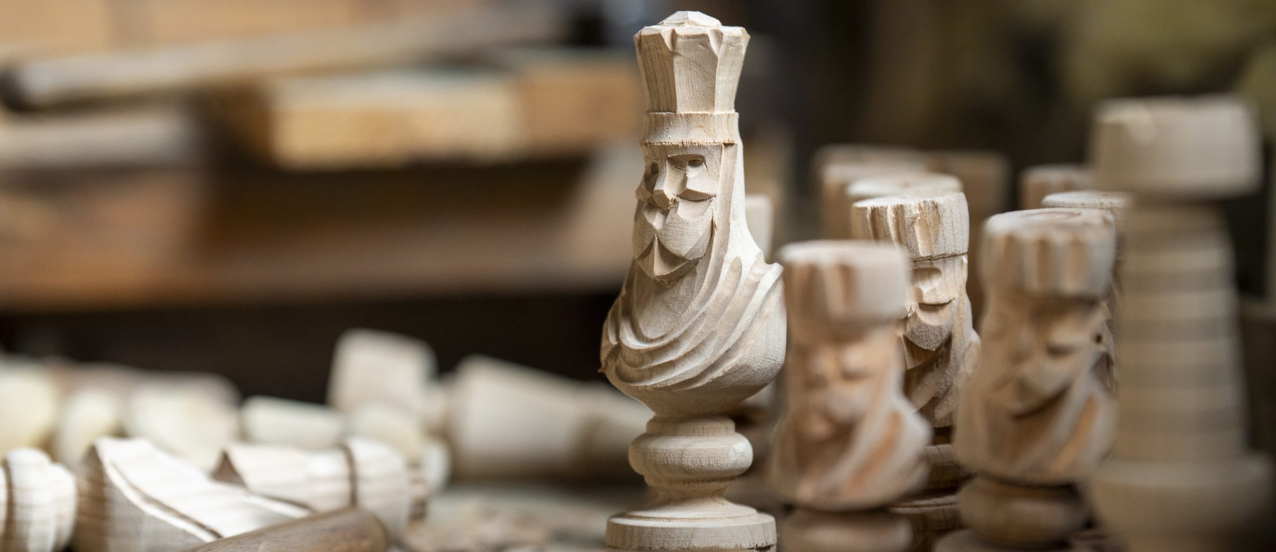 wooden crafted chess pieces